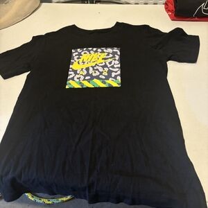 Black, green, yellow stone t shirt